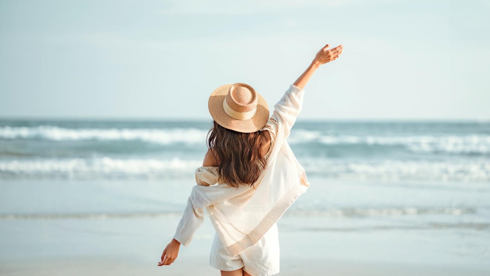 Woman on the beach with hair extensions